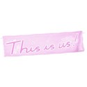 this is us pink sewn tag
