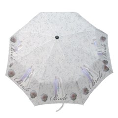 Bride folding umbrella